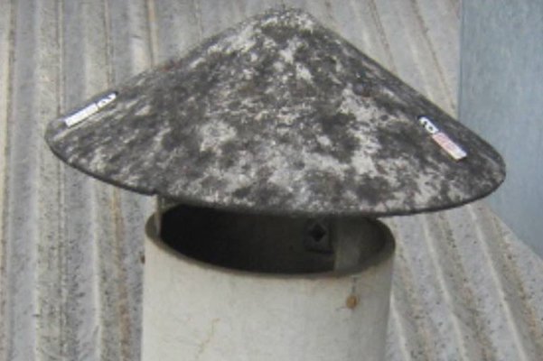 Cement flue removal on site, second photo