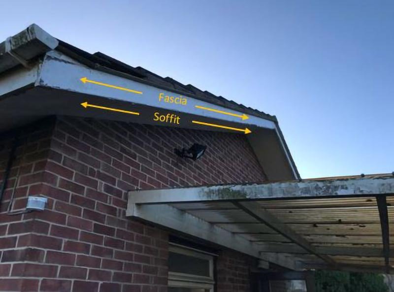 Cement soffit removal on site, second photo