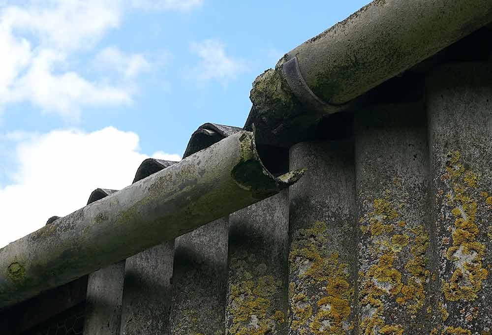 Gutter and downpipe removal on site, second photo